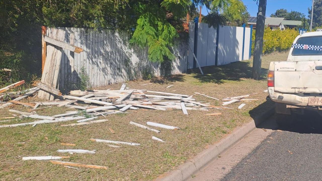 Man charged after car allegedly crashes through fence