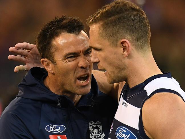 Cats coach Chris Scott (left) and captain Joel Selwood are seen during the First Elimination Final between the Melbourne Demons and the Geelong Cats in Week 1 of the AFL Finals Series at the MCG in Melbourne, Friday, September 7, 2018. (AAP Image/Julian Smith) NO ARCHIVING, EDITORIAL USE ONLY