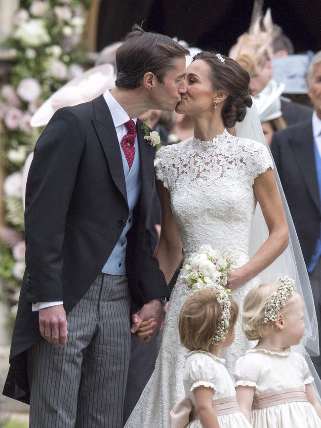 Pippa and James share a kiss on their wedding day. Picture: Getty