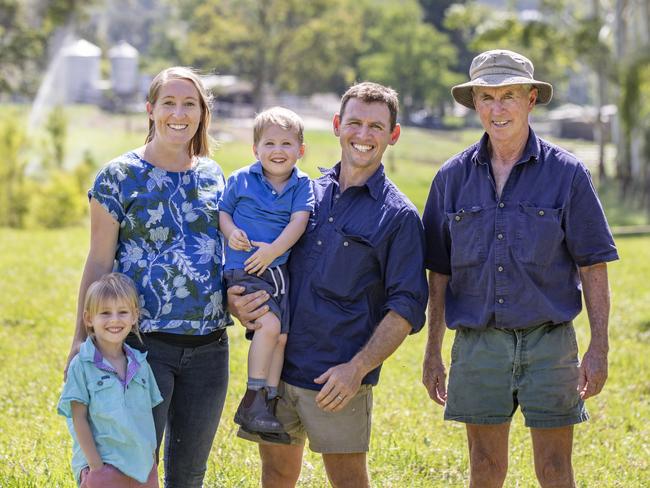 Woolworths Dairy Innovation Fund. James McRae on Raelands Farm Barrington NSW with his wife Lauren and their children, Hannah, 5 and Roy, 3. Raelands Farm Barrington NSW. 1st March 2023. Photograph Dallas Kilponen/Woolworths