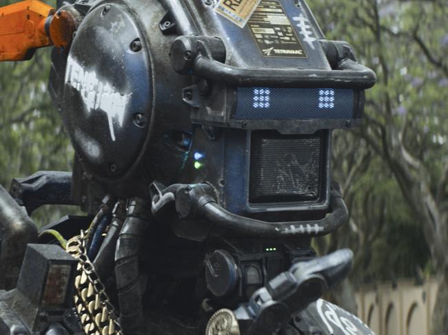 This image released by Columbia Pictures shows the character Chappie in a scene from "Chappie." (AP Photo/Columbia Pictures)