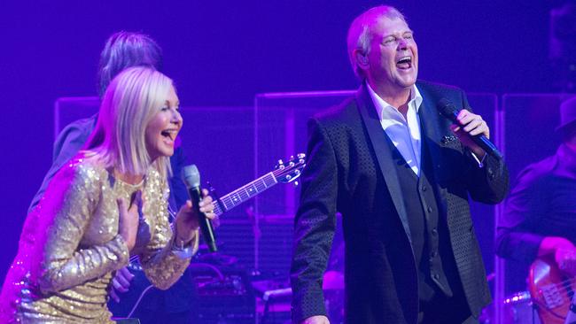 Two strong hearts ... Farnsey loving Livvy at Rod Laver Arena. Pic Stuart Walmsley