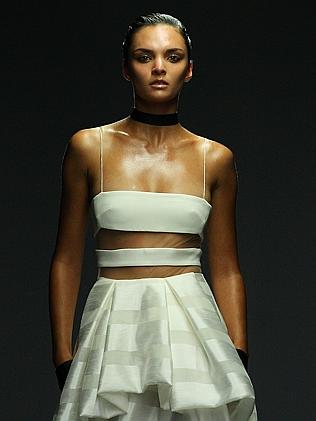 A model walks the runway at the Carla Zampatti show during Mercedes-Benz Fashion Week Australia.