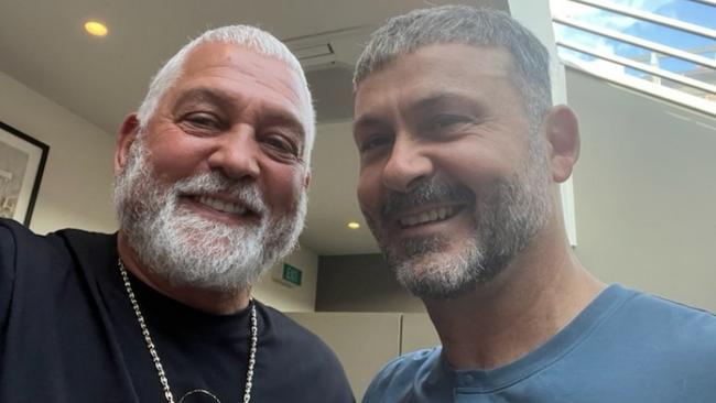 Mick Gatto and actor-writer Steve Bastoni, wearing a wig that will feature in the TV series about Gatto's life.