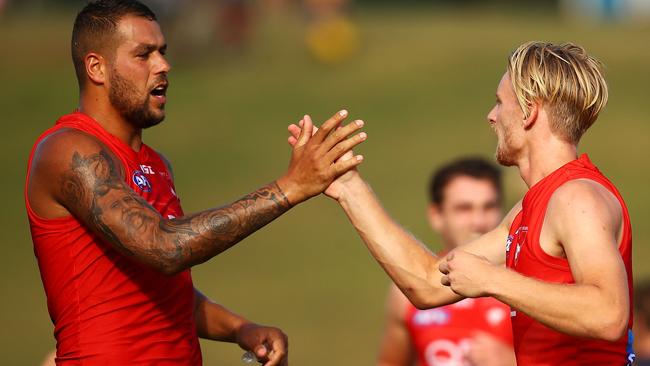 Lance Franklin celebrates a goal with James Rose. Picture: Getty Images