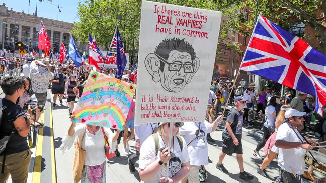 Protesters march in Melbourne CBD on Sunday.