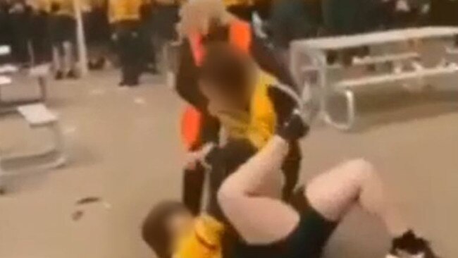 Screenshots from a video of students fighting at Golden Grove High School. Picture: Supplied