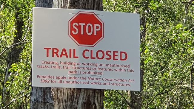 A sign showing some of the Nerang forest trails being closed off to bike riders in the Gold Coast hinterland.