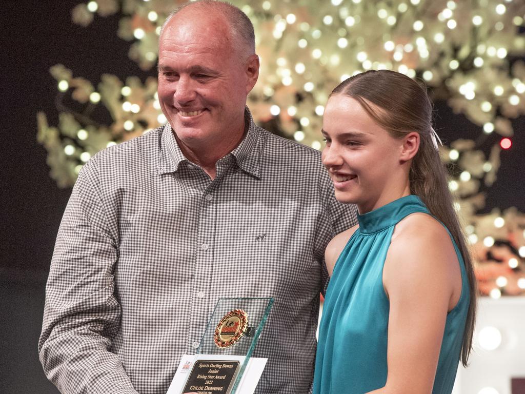 Chloe Denning received the Junior Rising Star award from Darren Holmes, Holmes Smash Repairs. Sports Darling Downs Sports Stars of the Year dinner. Saturday, February 11, 2023. Picture: Nev Madsen.