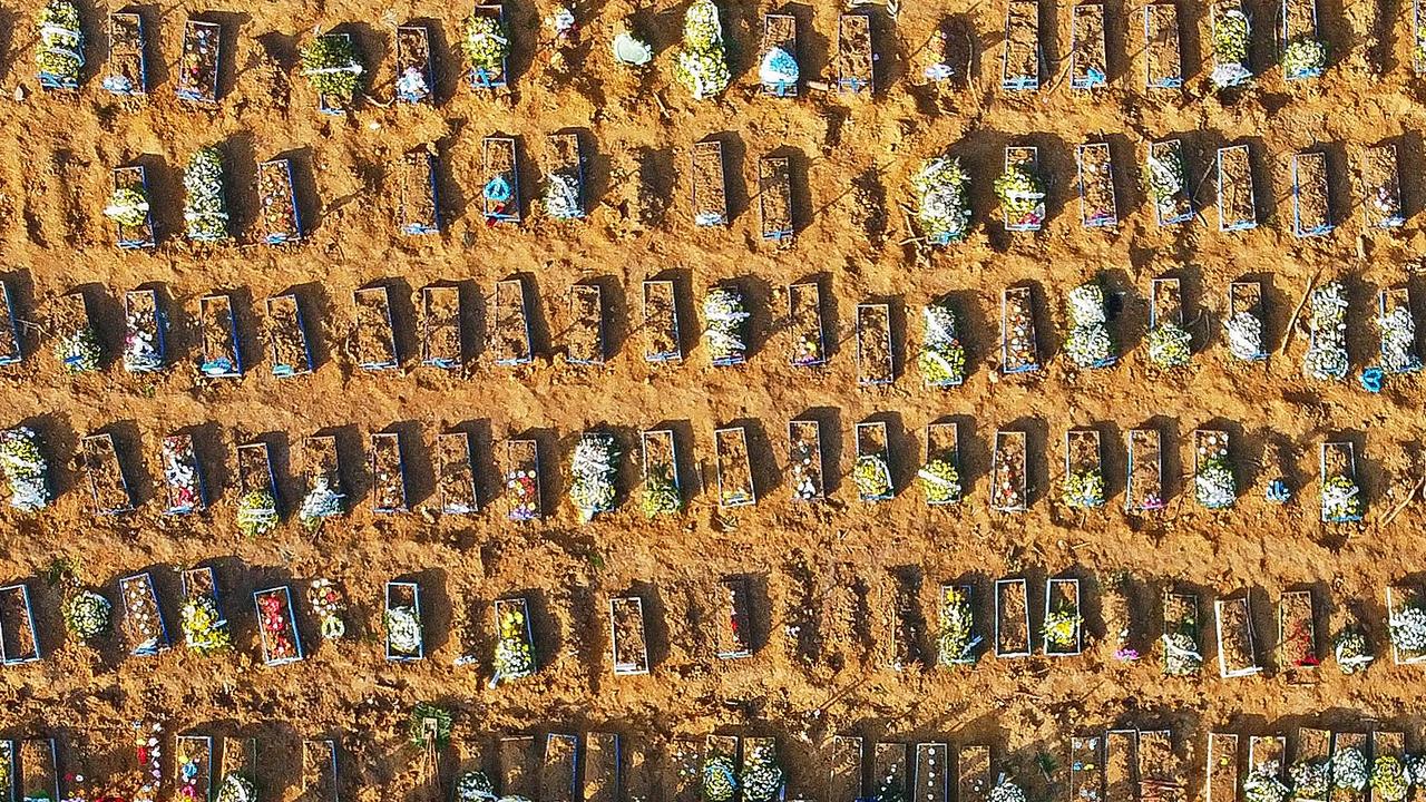 An aerial view of coffins being buried in Manaus, Amazonas State, Brazil, last year. Picture: Michael Dantas/AFP