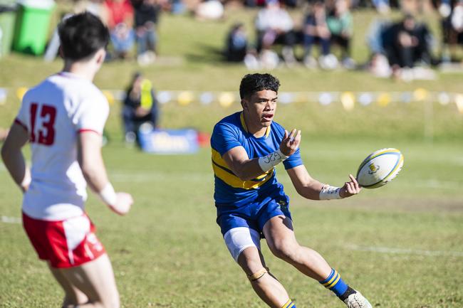 James Grey (No.13) defends Azariah Toki-Mautairi during the 2024 GPS rugby season. Picture: Kevin Farmer