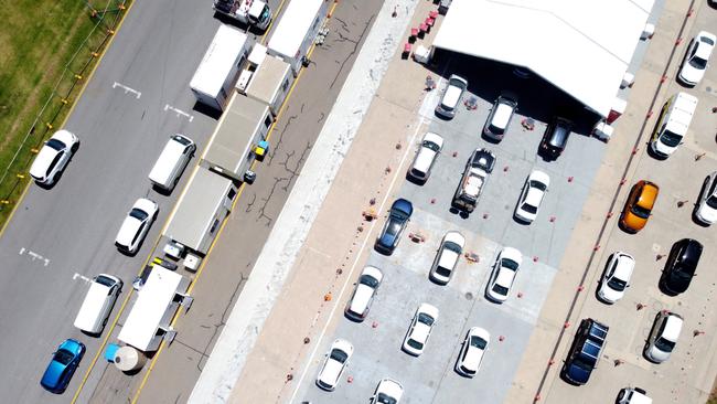 Cars queue for the COVID-19 testing facility at Victoria Park in November when the virus reappeared in Adelaide. Picture: Kelly Barnes/Getty Images