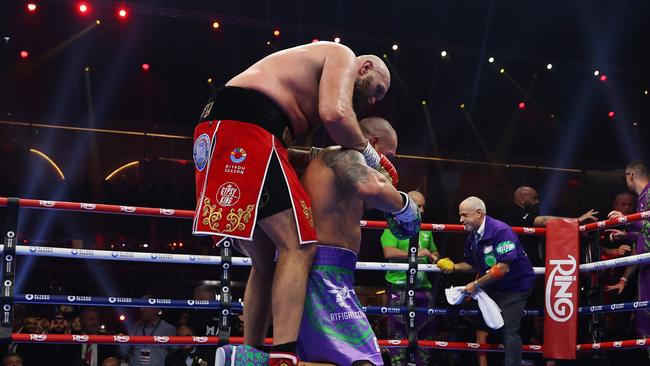 Tyson Fury and Oleksandr Usyk embrace after the fight. (Photo by Richard Pelham/Getty Images)