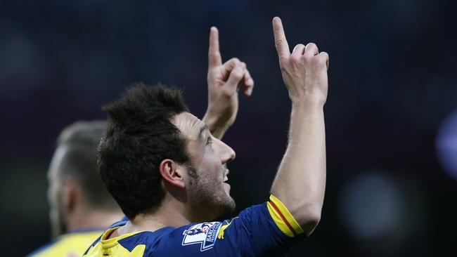 Arsenal's Santi Cazorla celebrates after scoring.