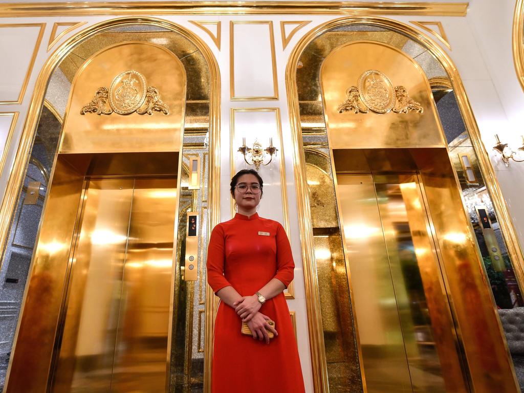 A staff member stands near the lifts in the lobby. Picture: Manan Vatsyayana/AFP