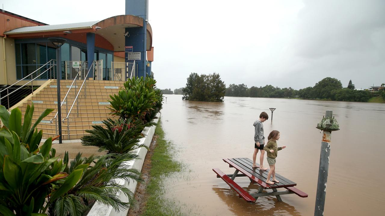 Heavy rain continues to batter the NSW mid north coast causing major flooding. Kempsey residents check the water levels at the towns levy wall . Nathan Edwards