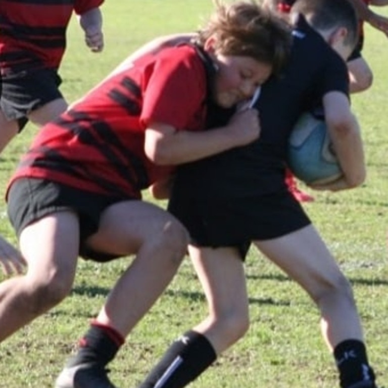 SA Little Legend Nash McCormick, 10, Onkaparinga Juniors (rugby union), shows his amazing tackling in a sport he loves. Picture supplied.