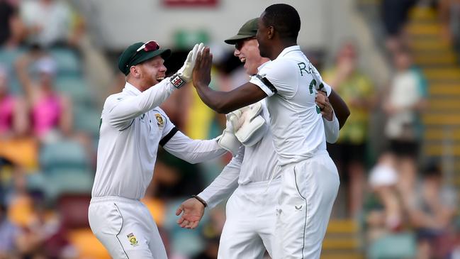 Kagiso Rabada celebrates taking David Warner’s wicket for a duck at the Gabba.