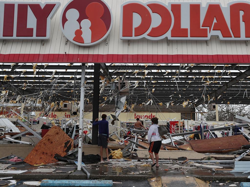 This store in Panama City, florida, had its front completely destroyed as Hurricane Michael passed through. Picture: Mark Wallheiser/Getty Images/AFP