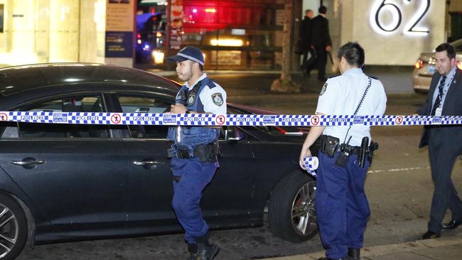 Police investigate the scene where two men were stabbed on Pitt St, Sydney on September 21. Picture: Steve Tyson