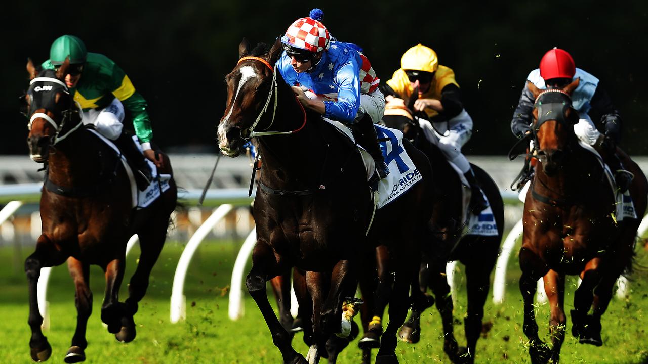 Jockey James McDonald rides no.4 La Amistad (second from left) to victory during race 3 at Warwick Farm racecourse, Sydney. Pic Brett Costello