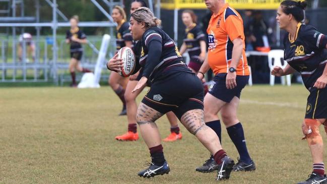 Caboolture Snakes women's captain Olivia Fido runs the ball up.