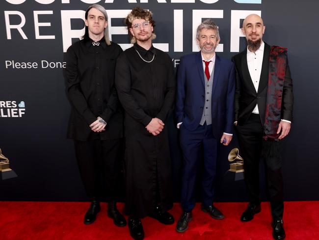 LOS ANGELES, CALIFORNIA - FEBRUARY 02:  Nick Azinas, Mike Hicks, and Alpha Wolf attend the 67th Annual GRAMMY Awards on February 02, 2025 in Los Angeles, California.  (Photo by Matt Winkelmeyer/Getty Images for The Recording Academy)