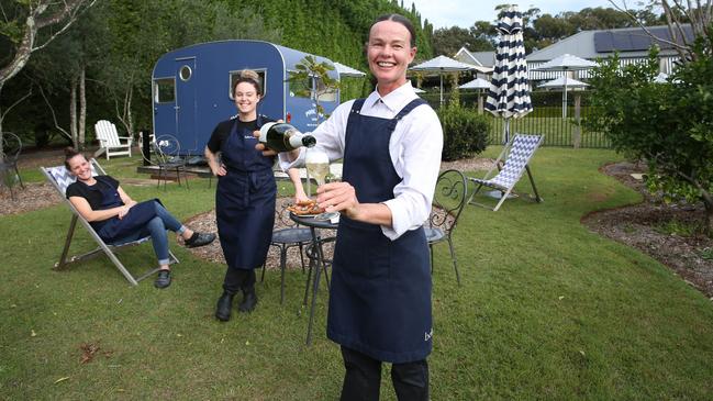 Bells of Killcare staff members Nikki Rollett, Elyse Vella and Libby Rowbothen, front, are looking forward to welcoming guests soon. Picture: Britta Campion