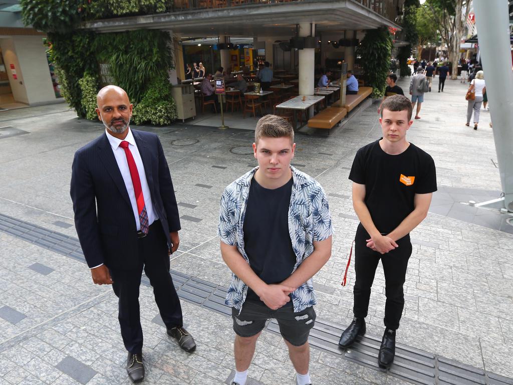 Alex Knott, centre, with Giri Sivaraman of Maurice Blackburn, left, and United Workers Union organiser Martin De Rooy. Picture David Clark