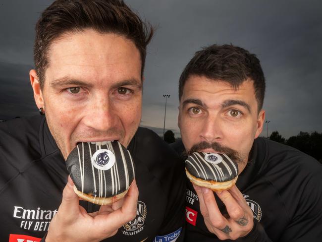 Jack Crisp and Oleg Markov ring in international donut day. Picture: Tony Gough