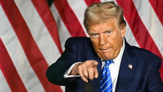 TOPSHOT - Former US President and Republican presidential candidate Donald Trump speaks during a campaign event at Discovery World in Milwaukee, Wisconsin, October 1, 2024. (Photo by Jim WATSON / AFP)