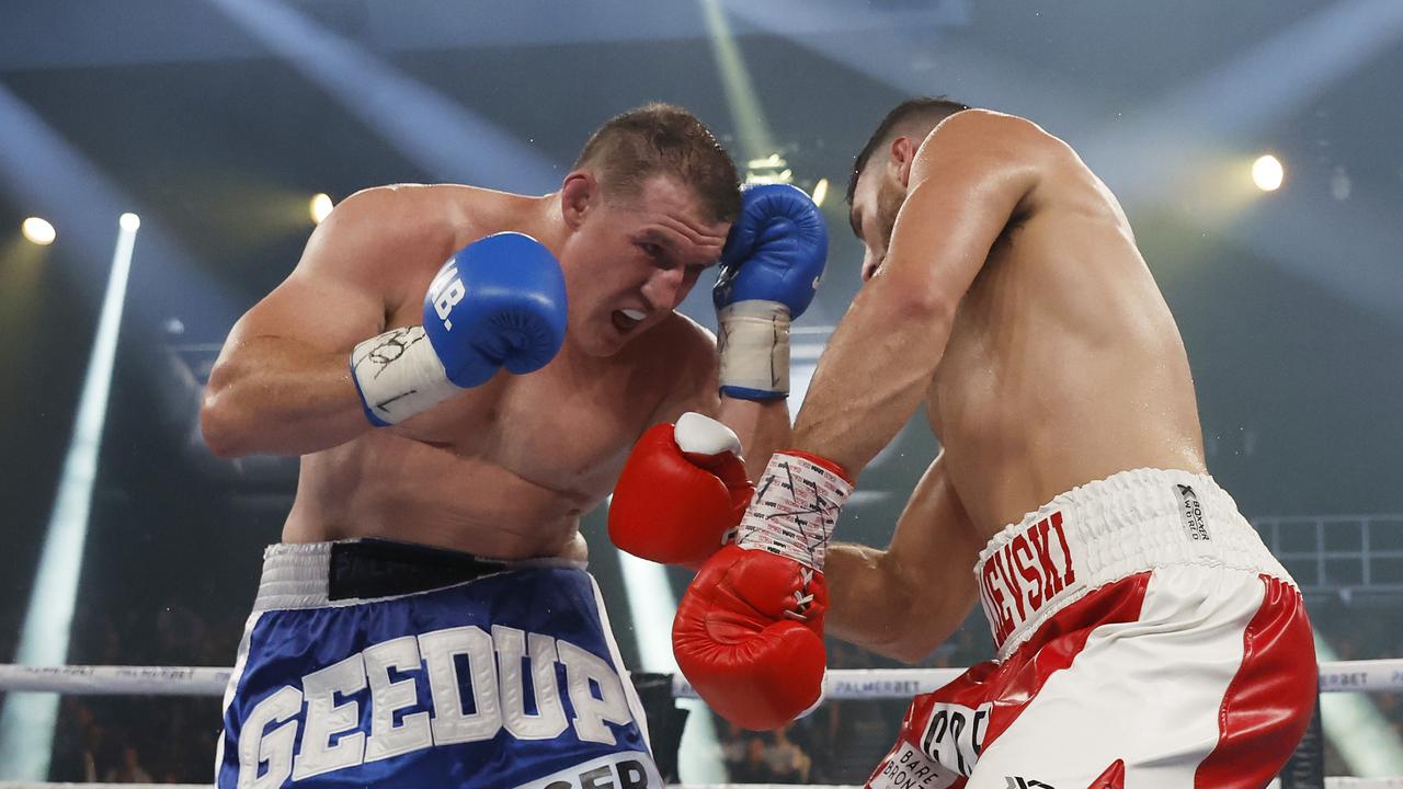 Paul Gallen throws a punch. Photo by Mark Evans/Getty Images.