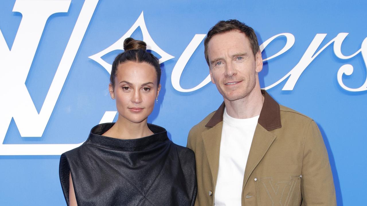 Alicia Vikander and Michael Fassbender attend the Louis Vuitton Menswear Spring/Summer 2025 show as part of Paris Fashion Week on June 18, 2024 in Paris, France. Photo: Julien M. Hekimian/Getty Images.