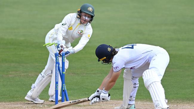 Alyssa Healy is playing with broken fingers. Picture: Gareth Copley/Getty Images