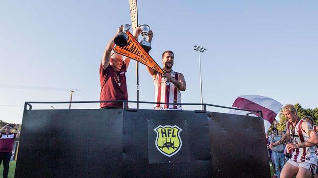 Dale Eichner holds the 2023 premiership trophy with captain Brock Knott. Picture: Nairne Bremer United Football Club