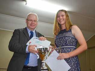 Warwick Credit Union CEO Lewis von Stieglitz and overall junior winner Kira Holmes at the awards at Hawker Rd Function Centre. Picture: Jiordan Tolli