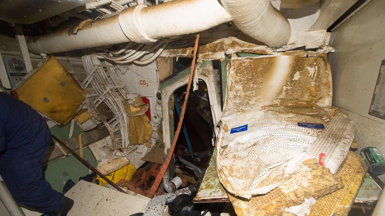 This view shows the starboard access trunk as seen from berthing area 2. Several sailors were trapped while attempting to escape the room as it flooded. Picture: USN