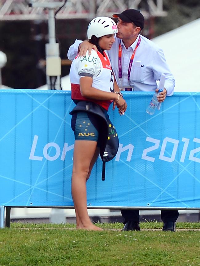 Richard Fox consoles daughter Jess Fox at the 2012 London Olympics.