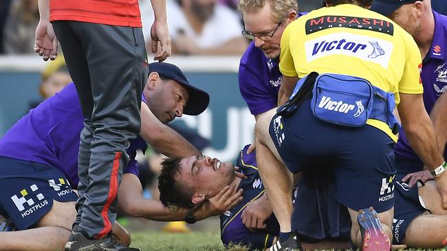 Doctors keep Ryan Papenhuyzen’s neck steady after the hit. Picture: Albert Perez/Getty Images