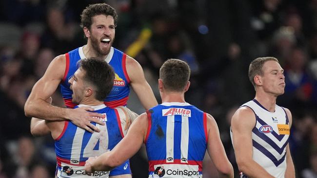 MELBOURNE, AUSTRALIA - JUNE 15: Marcus Bontempelli of the Bulldogs celebrates kicking a goal during the round 14 AFL match between Western Bulldogs and Fremantle Dockers at Marvel Stadium, on June 15, 2024, in Melbourne, Australia. (Photo by Daniel Pockett/Getty Images)