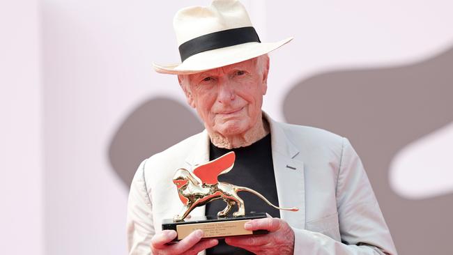 Peter Weir poses with his Golden Lion for Lifetime Achievement award in Venice on Tuesday. Picture: Getty Images