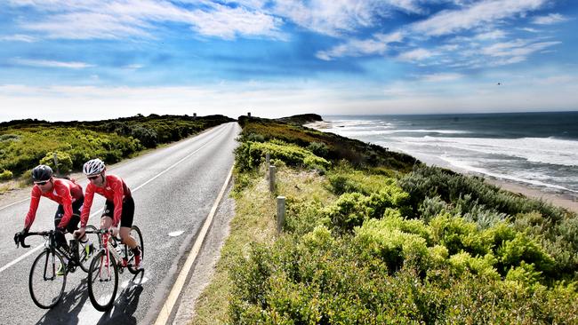 Cadel Evans and Sam Edmund ride the picturesque route. Picture: Michael Klein