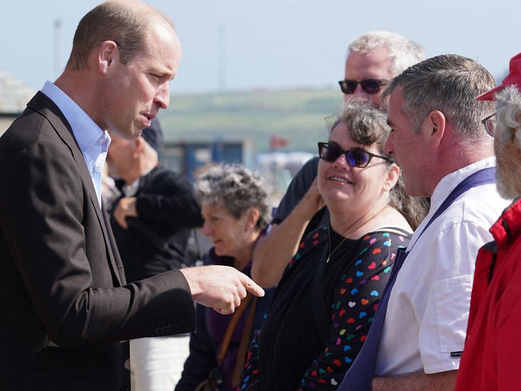 The prince was greeted by members of the public at St. Mary’s Harbour. Picture: Ben Birchall/Pool/AFP