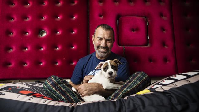 Paul Mac at his home studio with little mate George Michael . Picture: Hollie Adams 