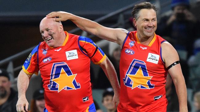 Andrew Jarman and Tony Modra. (AAP Image/David Mariuz)