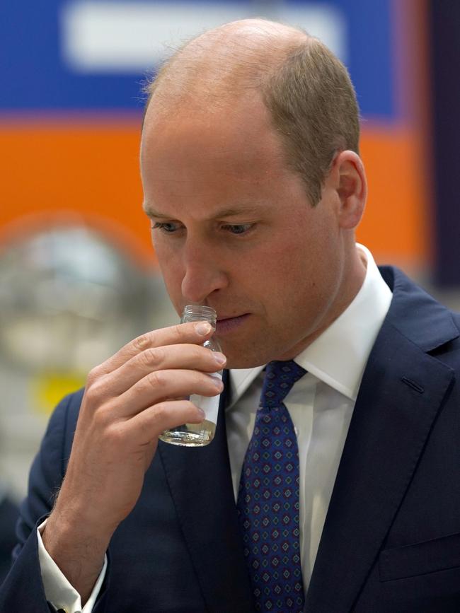 Prince William, Duke of Cambridge, samples a drink during a visit the AG Barr's factory, where the Irn-Bru drink is manufactured. Picture: Getty