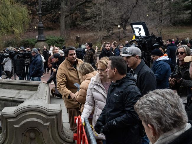 Members of the public watch as the New York City police department conducts an aquatic search near Bethesda Fountain in Central Park. Picture: Getty Images via AFP