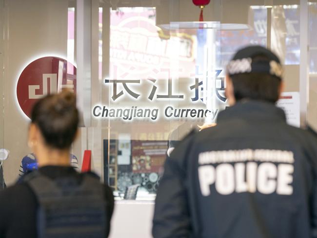 Search warrant at Changjiang Currency Exchange in Sydney CBD conducted as part of Operation Avarus-Nightwolf.