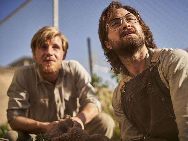 Daniel Radcliffe and Daniel Webber playing characters Tim Jenkin and Stephen Lee, who are both civil rights activists.