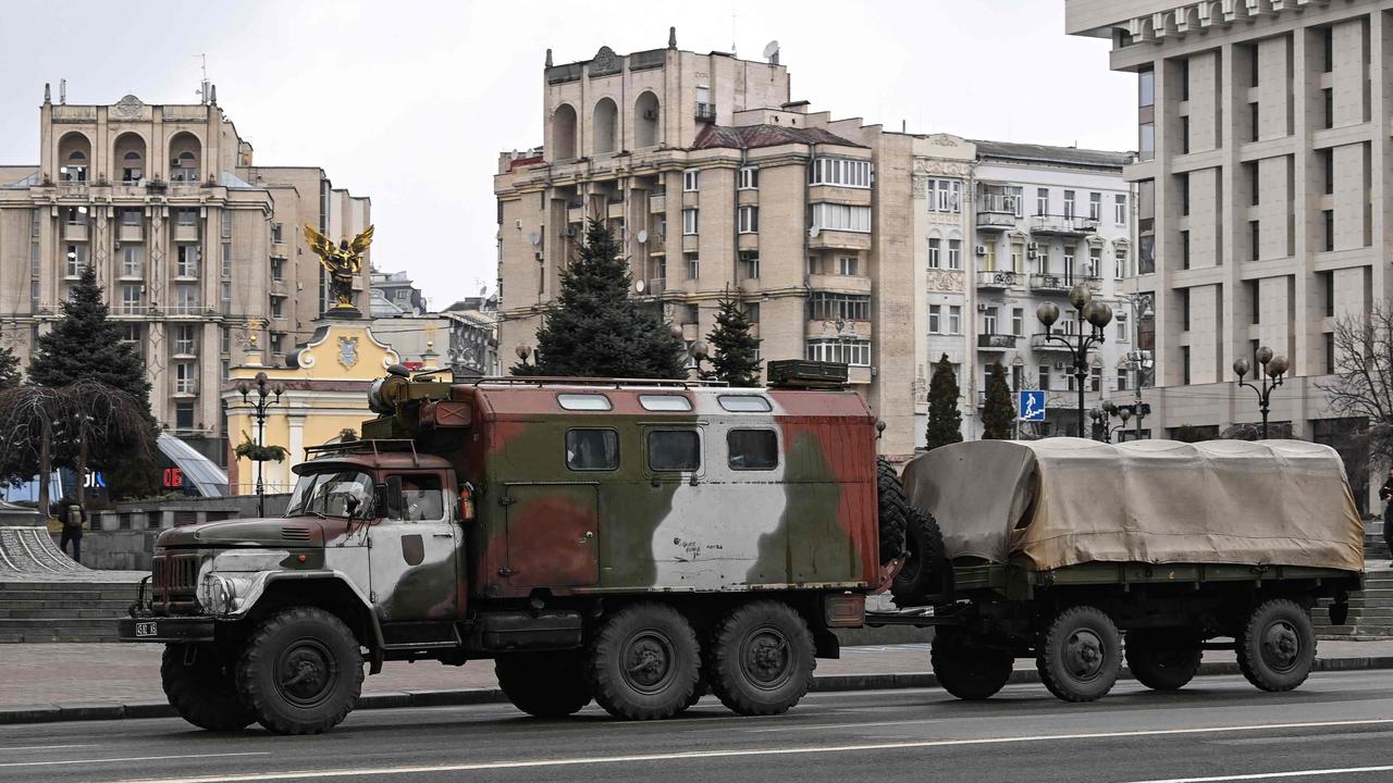 A military cargo truck is pictured in central Kyiv in the morning on February 24, 2022. Picture: Daniel Leal/ AFP